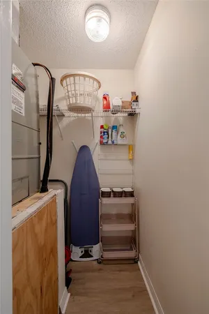 a view of storage and utility room with washer and dryer