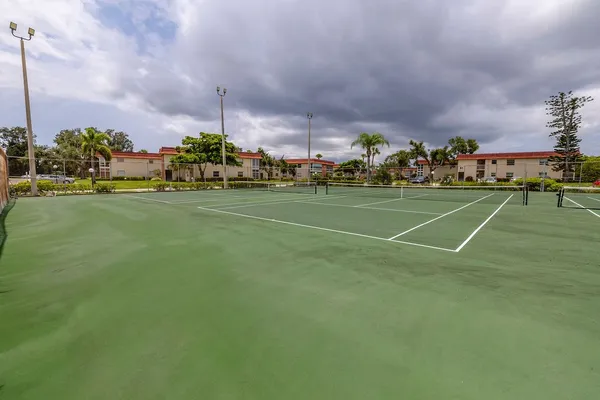 a view of a golf course with a lake