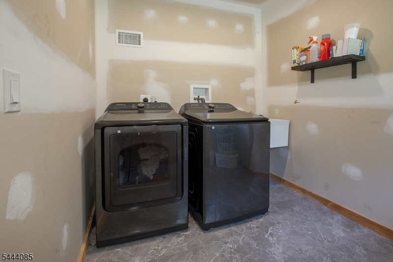 79 Lake Wallkill Road Vernon, NJ 07461 - Photo 17 of 27 a utility room with dryer and washer