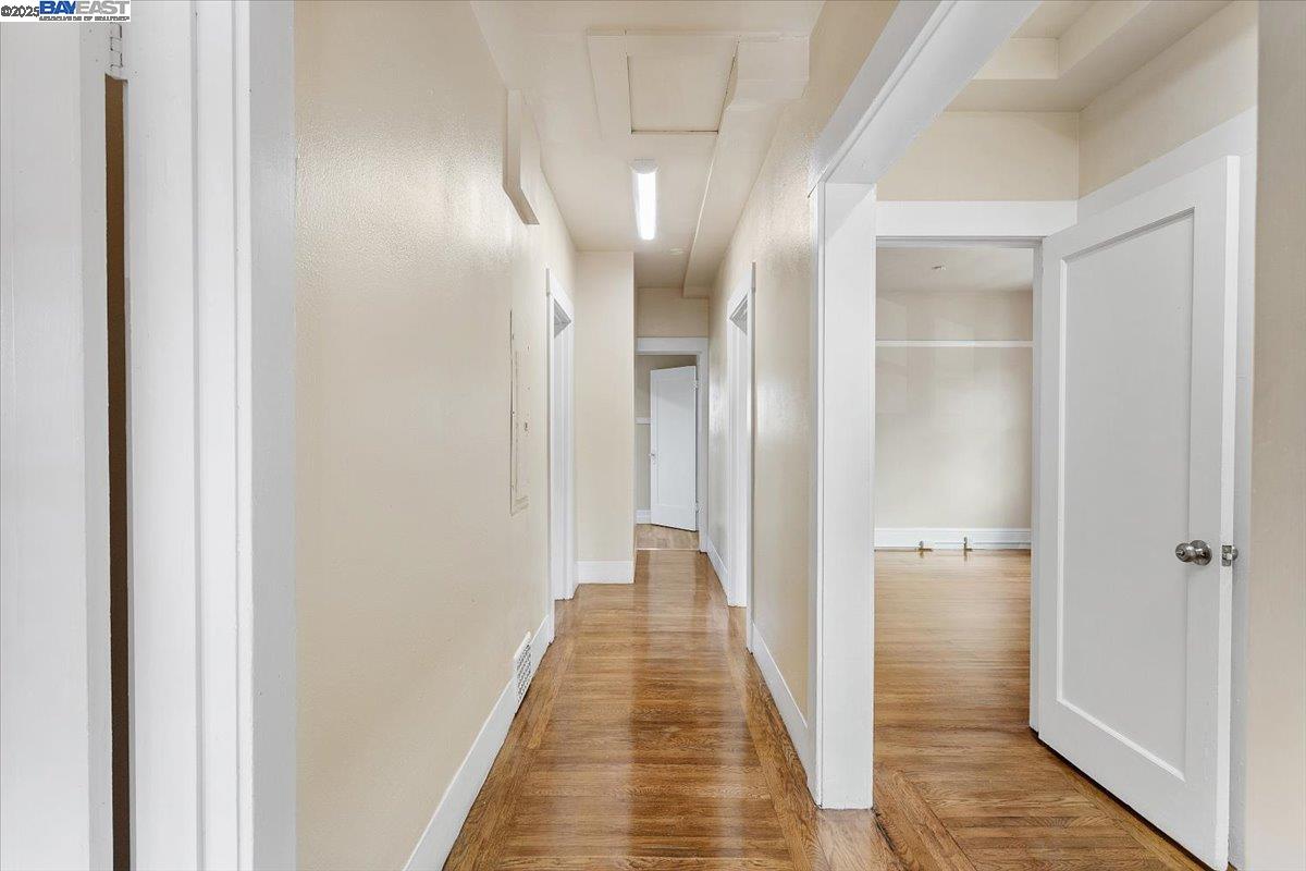 629 Santa Clara Avenue Alameda, CA 94501 - Photo 18 of 47 a view of a hallway with wooden floor