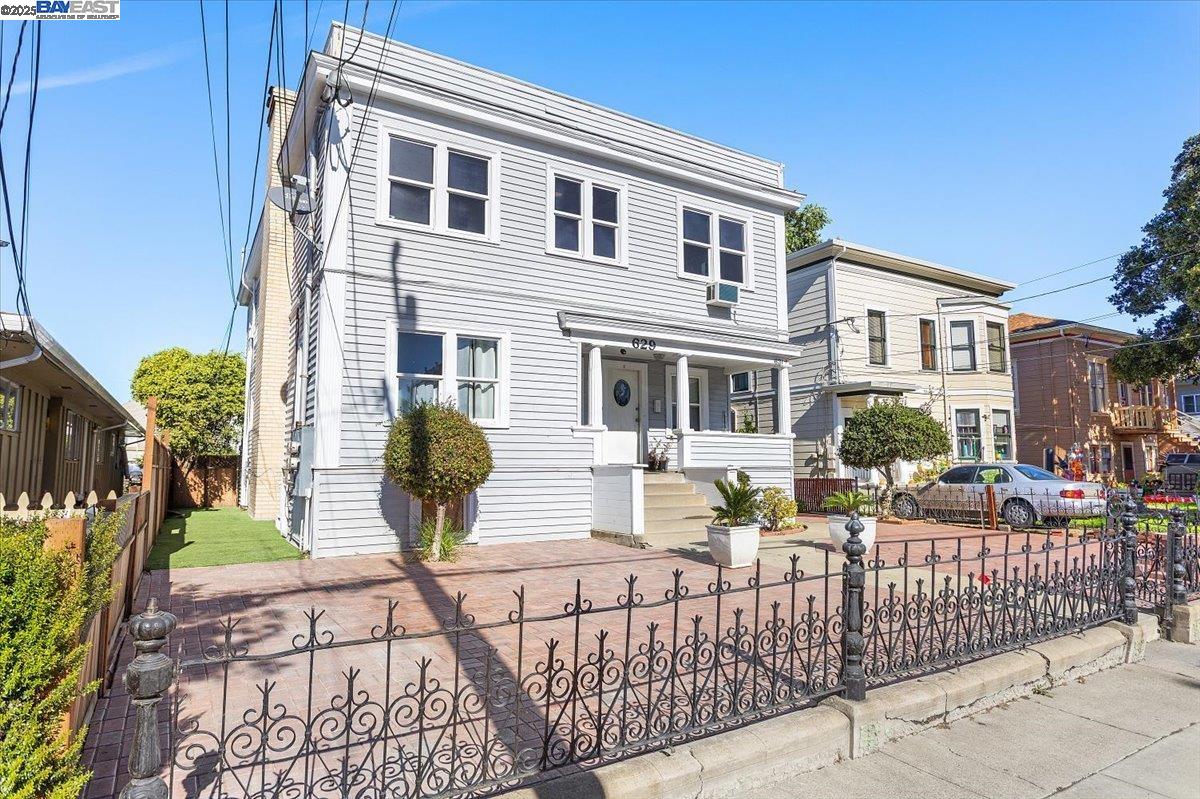 629 Santa Clara Avenue Alameda, CA 94501 - Photo 3 of 47 a view of a house with backyard and sitting area