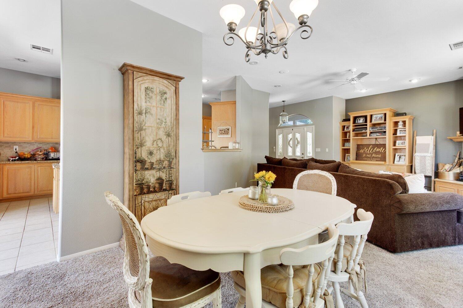 19510 Banducci Road Tehachapi, CA 93561 - Photo 16 of 75 a view of a dining room with furniture and chandelier