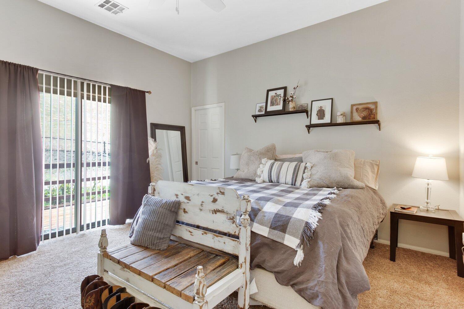 19510 Banducci Road Tehachapi, CA 93561 - Photo 26 of 75 a bed room with a bed and a chair