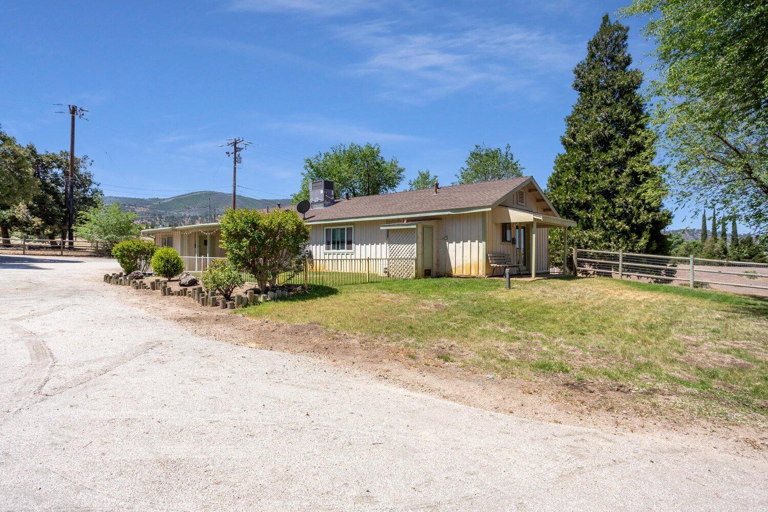 19510 Banducci Road Tehachapi, CA 93561 - Photo 47 of 75 a front view of a house with garden