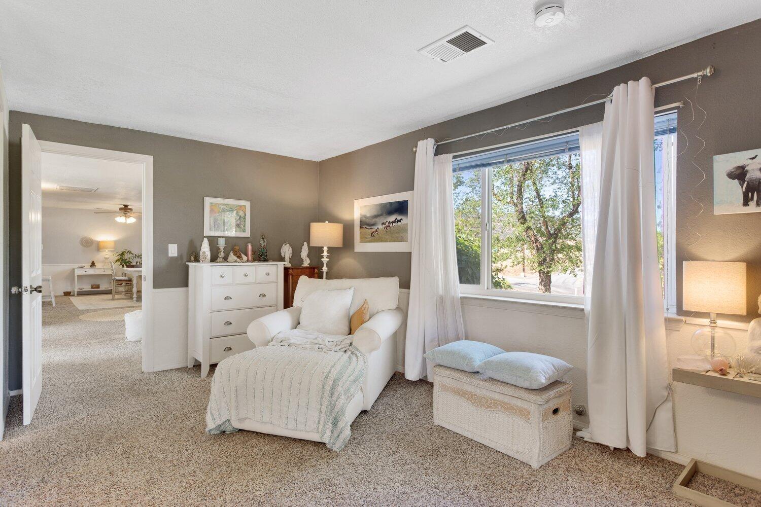 19510 Banducci Road Tehachapi, CA 93561 - Photo 65 of 75 a living room with furniture and a large window