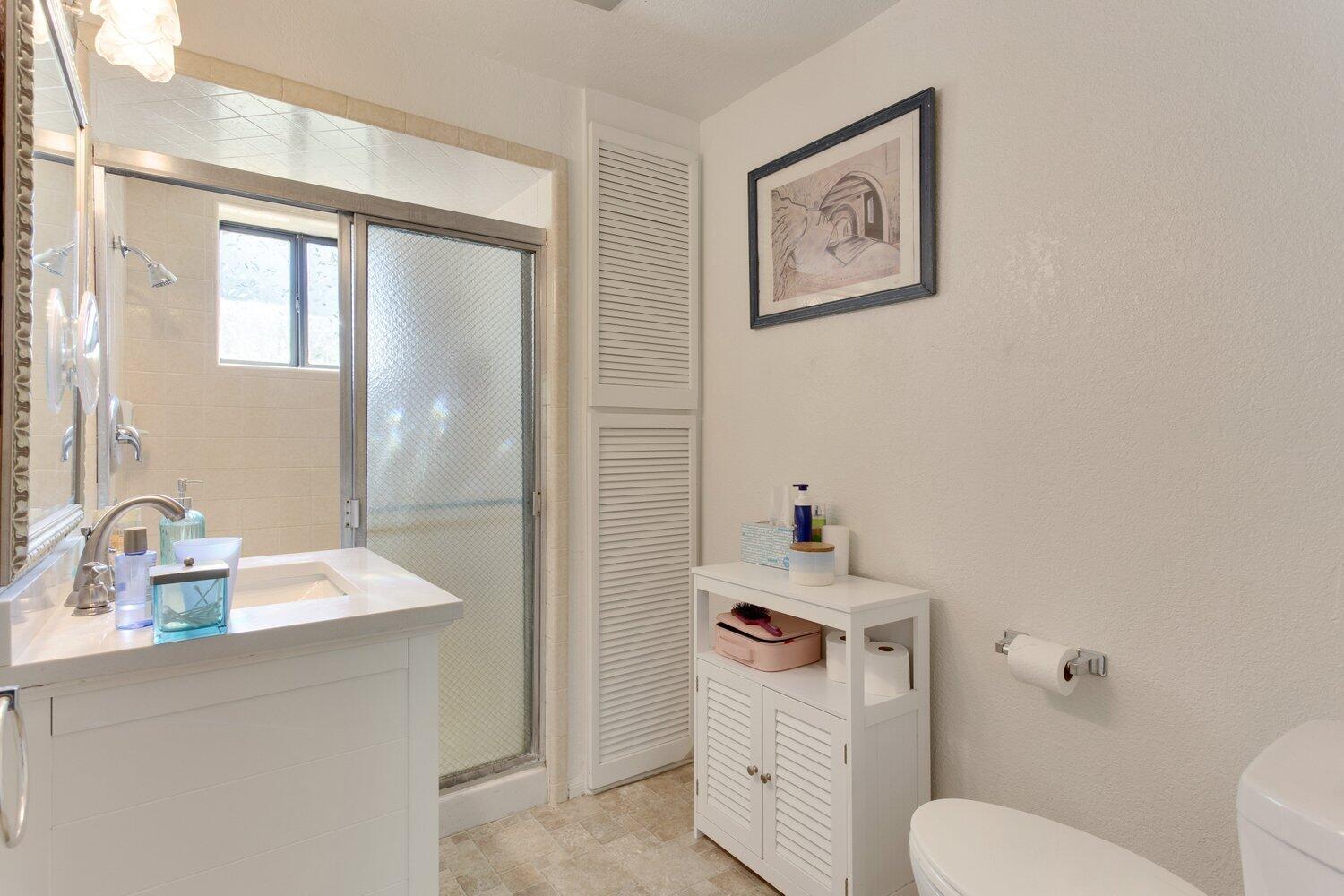19510 Banducci Road Tehachapi, CA 93561 - Photo 67 of 75 a bathroom with a toilet sink and mirror