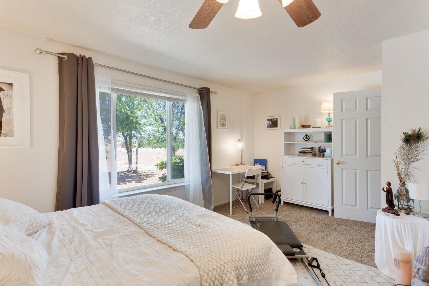 19510 Banducci Road Tehachapi, CA 93561 - Photo 70 of 75 a bedroom with a bed and large window