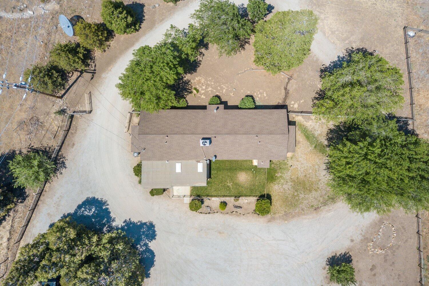 19510 Banducci Road Tehachapi, CA 93561 - Photo 75 of 75 an aerial view of a house with a yard and a large tree