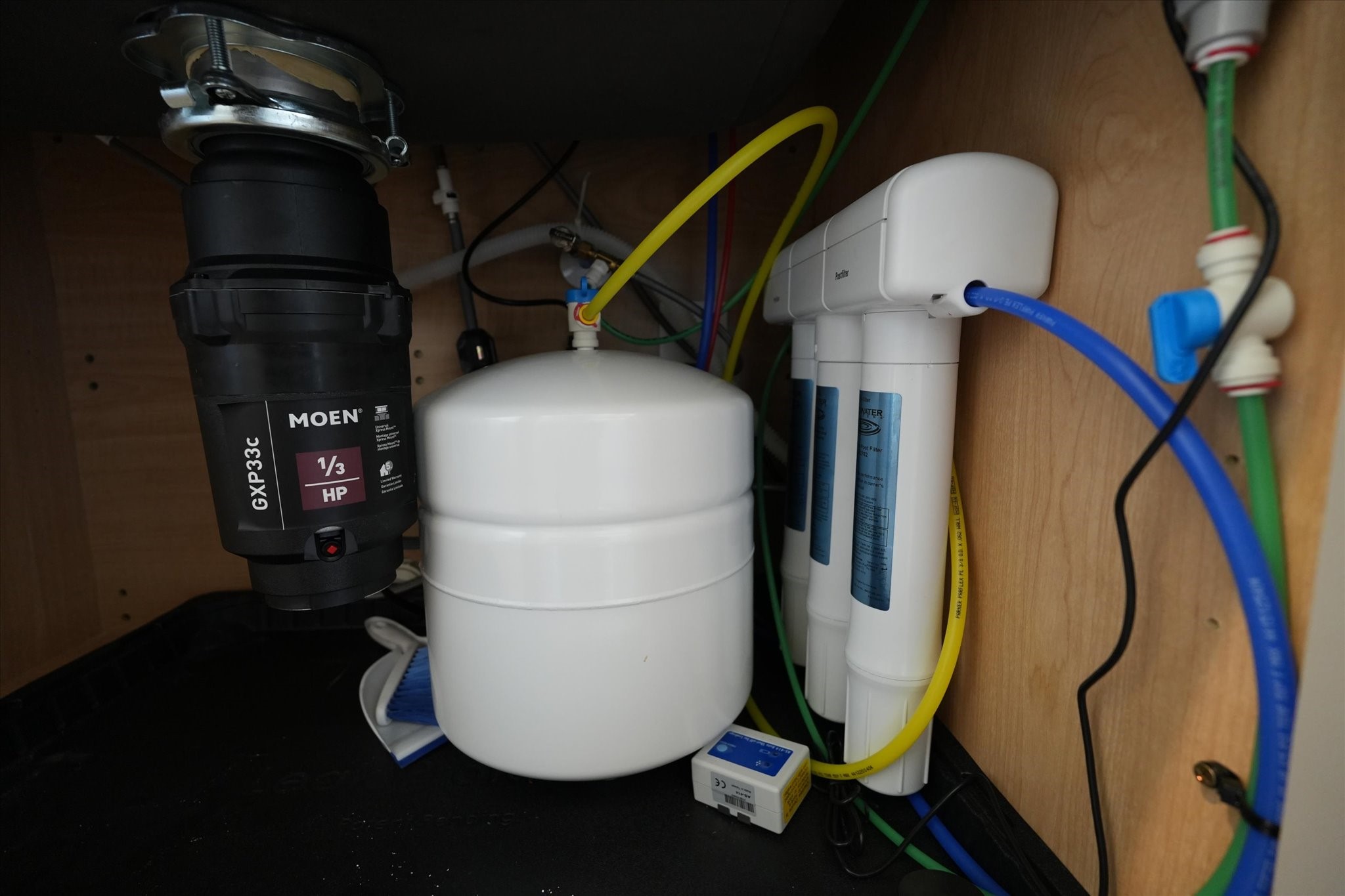 8102 Buck Lane Rosharon, TX 77583 - Photo 6 of 26 Installed under the sink water purifier.