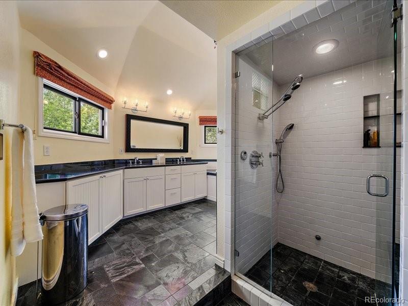 9306 Sulton Court Highlands Ranch, CO 80126 - Photo 19 of 48 a bathroom with a sink and a mirror