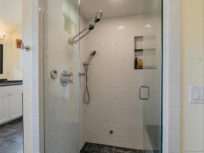 9306 Sulton Court Highlands Ranch, CO 80126 - Photo 21 of 48 a bathroom with a shower