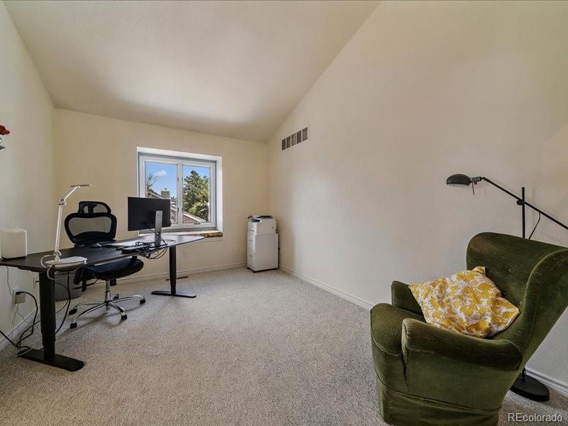 9306 Sulton Court Highlands Ranch, CO 80126 - Photo 28 of 48 a view of a workspace with furniture and a window