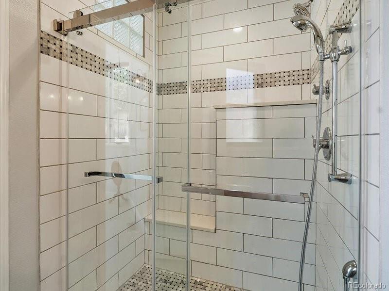 9306 Sulton Court Highlands Ranch, CO 80126 - Photo 33 of 48 a bathroom with a shower