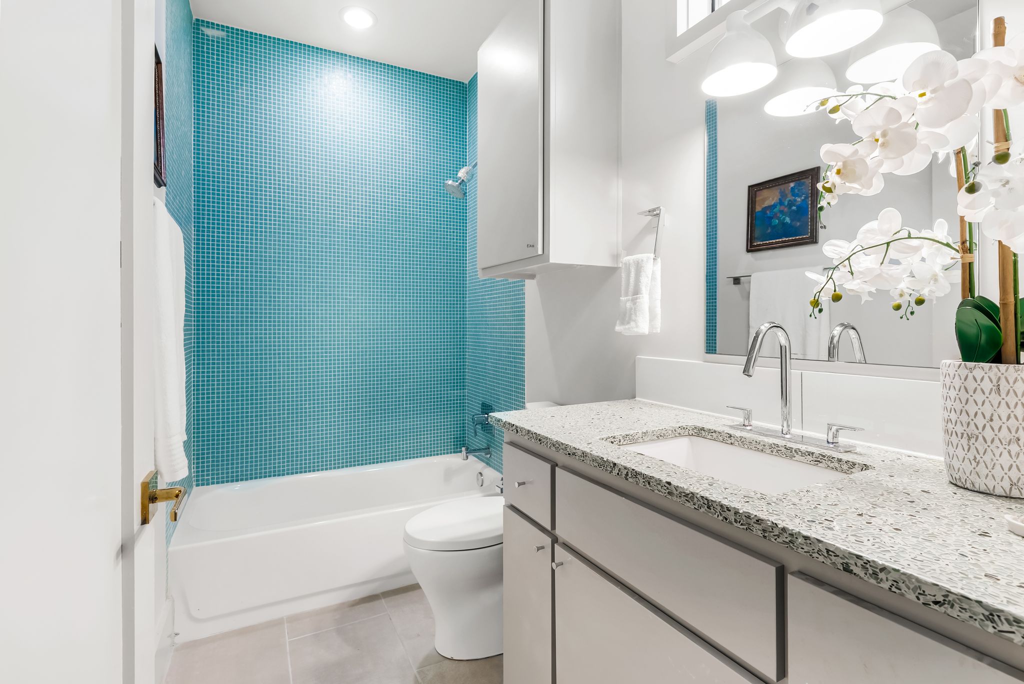 513 El Paso Street Austin, TX 78704 - Photo 13 of 34 a bathroom with a granite countertop sink a toilet and bathtub