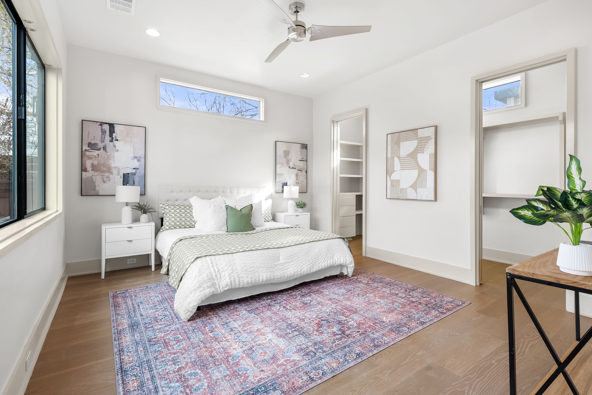 513 El Paso Street Austin, TX 78704 - Photo 14 of 34 a spacious bedroom with a bed and a window