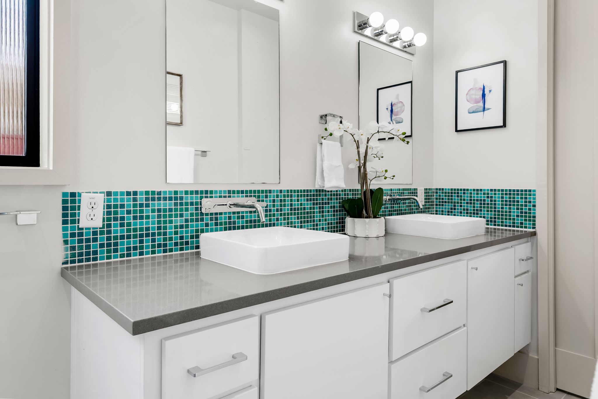 513 El Paso Street Austin, TX 78704 - Photo 21 of 34 a bathroom with a granite countertop sink a mirror and vanity