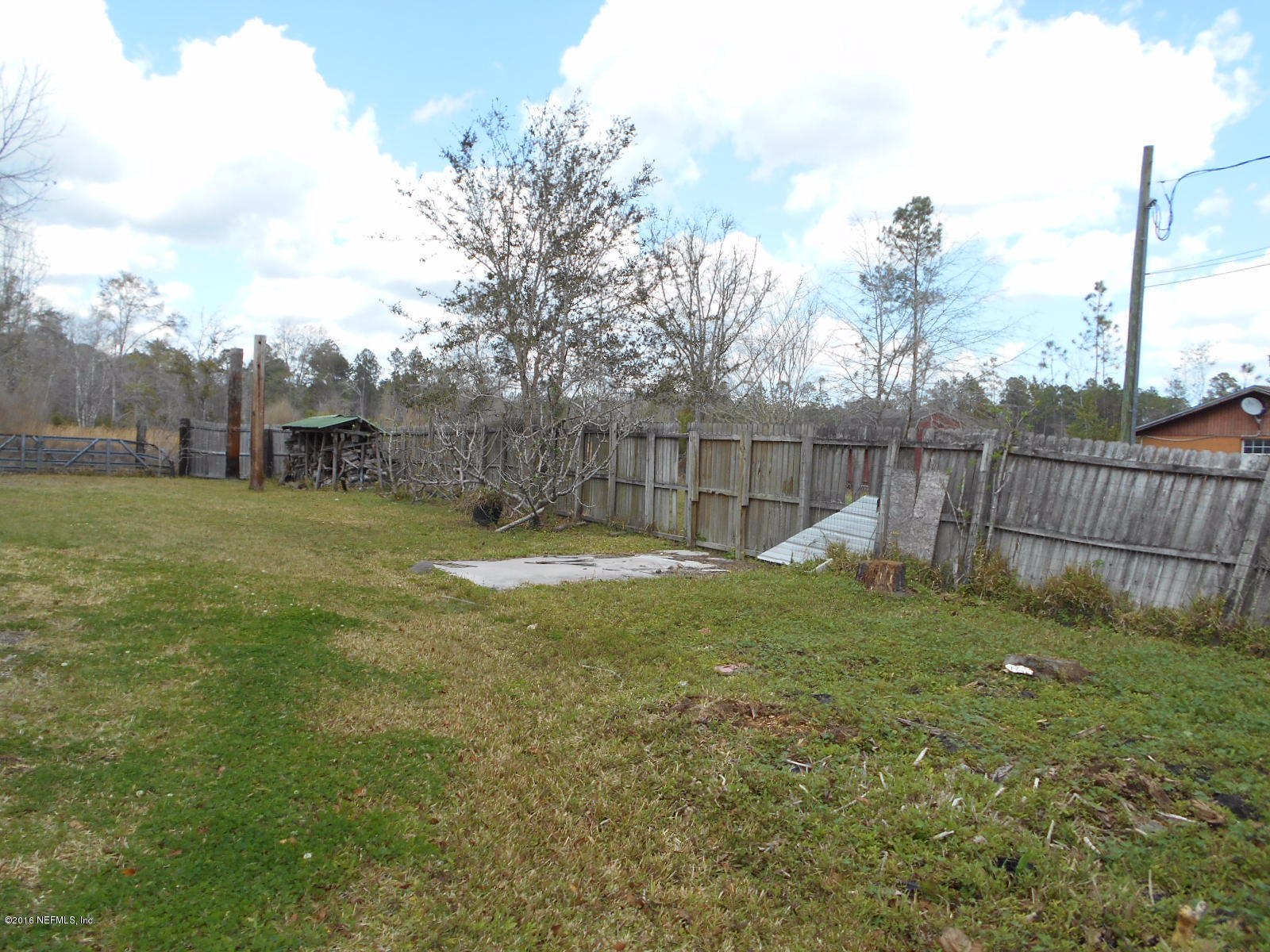 75179 Randy Road Yulee, FL 32097 - Photo 31 of 56 a view of a garden with a small house