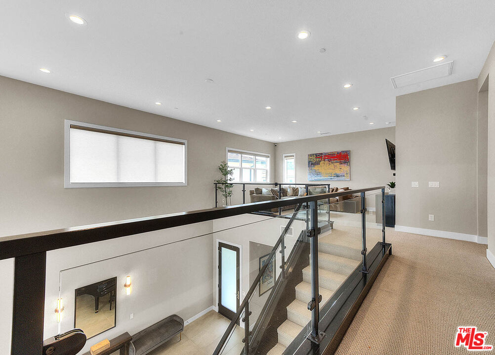 20558 Overlook Court Porter Ranch, CA 91326 - Photo 29 of 48 a view of a hallway