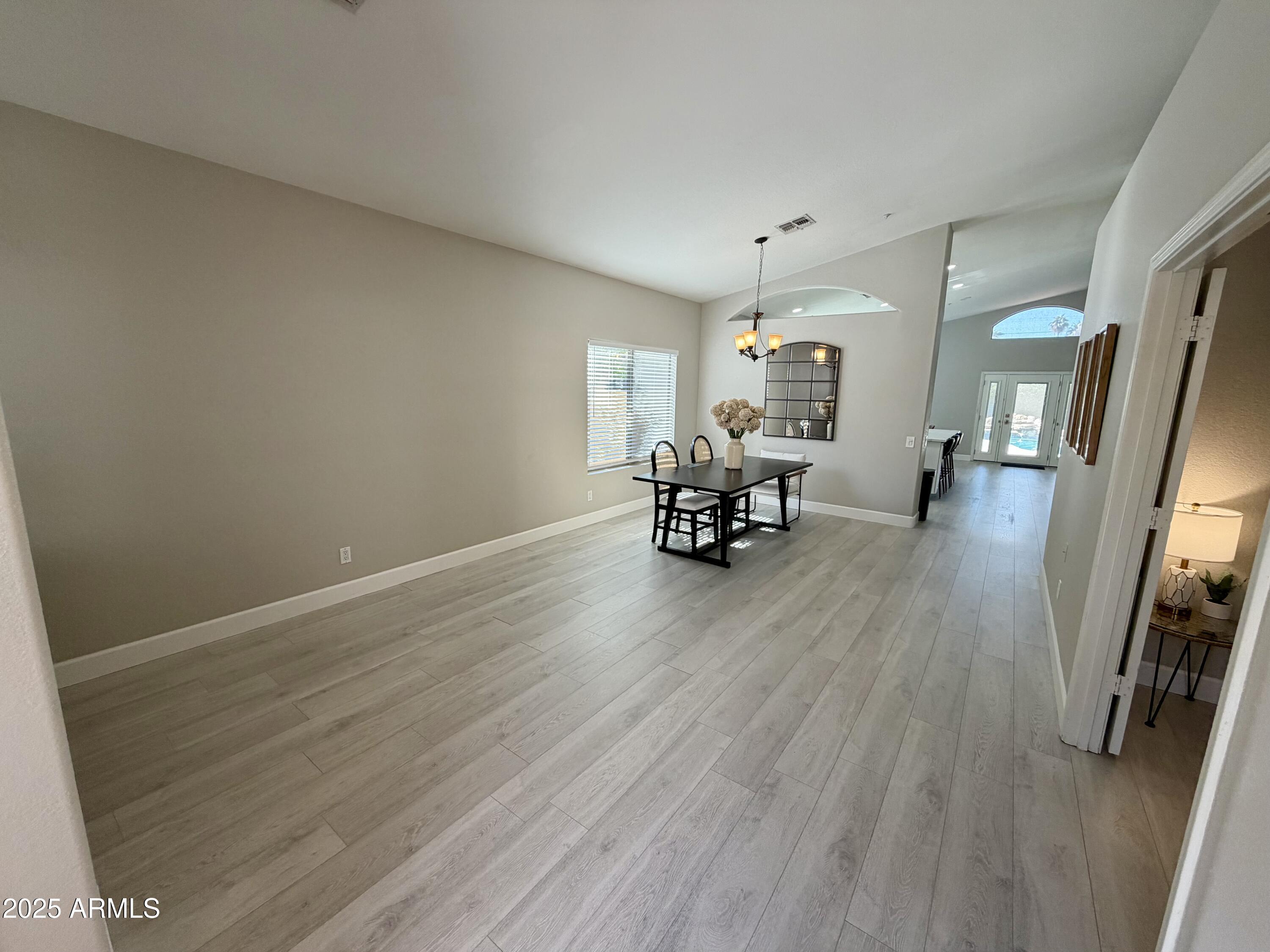 3068 North 83rd Place Scottsdale, AZ 85251 - Photo 13 of 46 a view of a livingroom with furniture and wooden floor