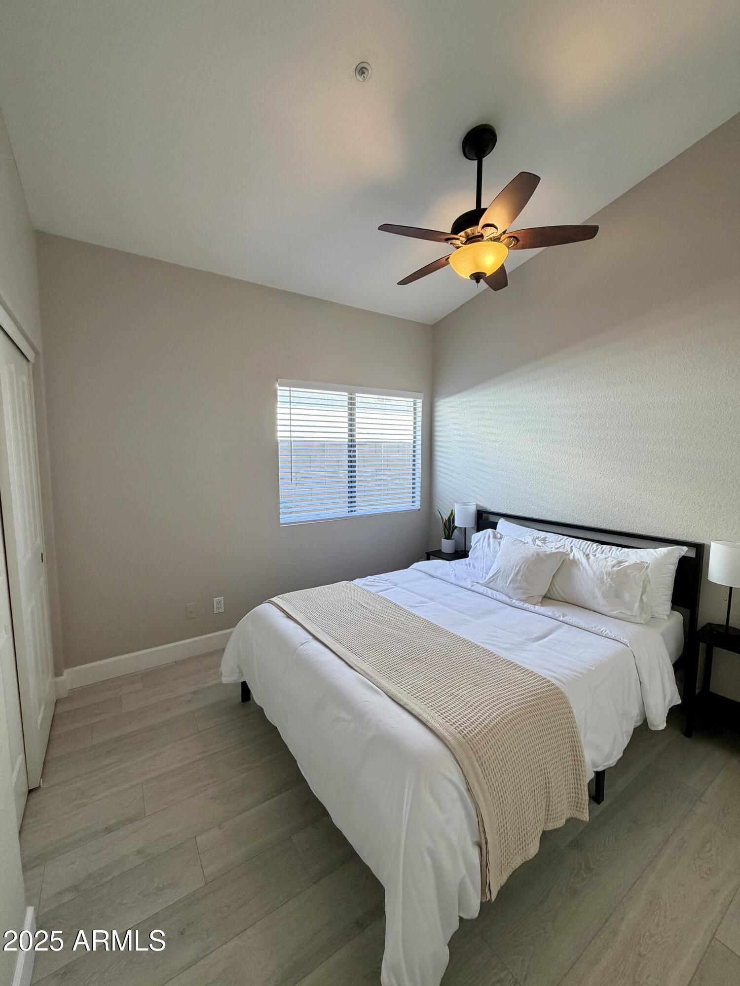 3068 North 83rd Place Scottsdale, AZ 85251 - Photo 26 of 46 a bedroom with bed and window