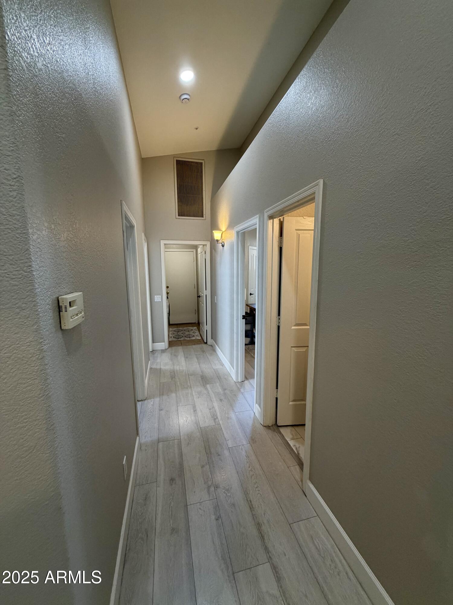 3068 North 83rd Place Scottsdale, AZ 85251 - Photo 30 of 46 a view of hallway with wooden floor