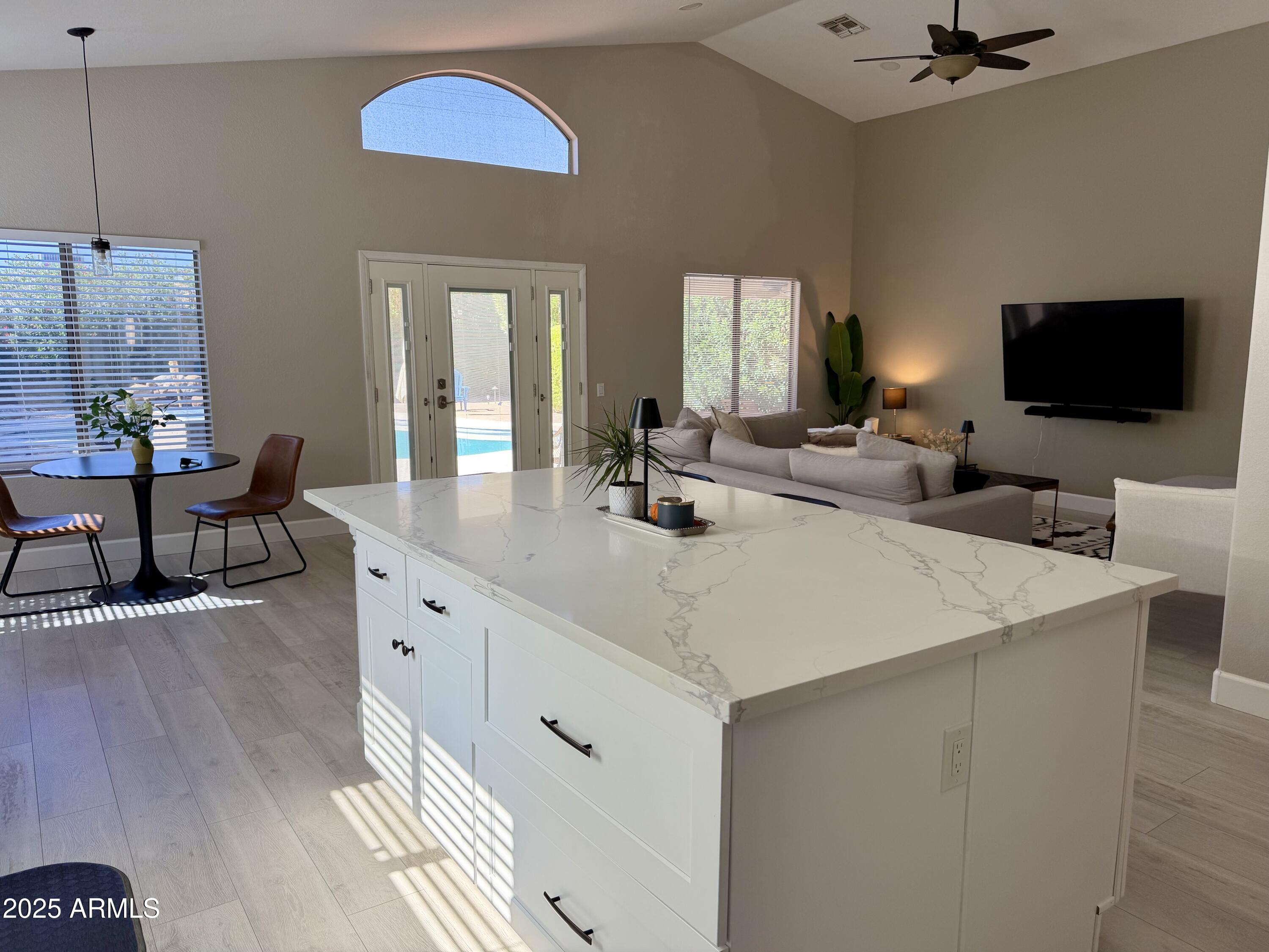 3068 North 83rd Place Scottsdale, AZ 85251 - Photo 38 of 46 a view of living room with furniture and flat screen tv