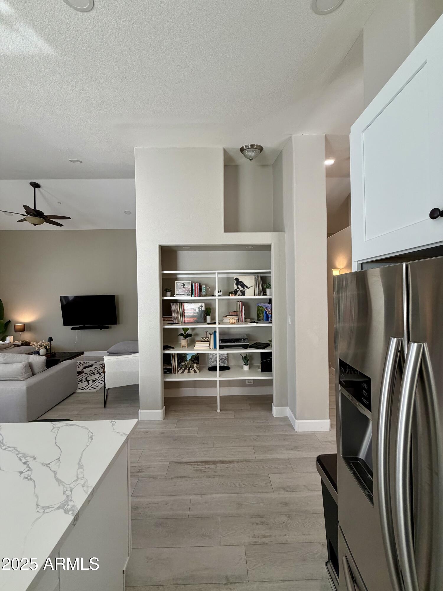 3068 North 83rd Place Scottsdale, AZ 85251 - Photo 39 of 46 a living room with furniture and a flat screen tv