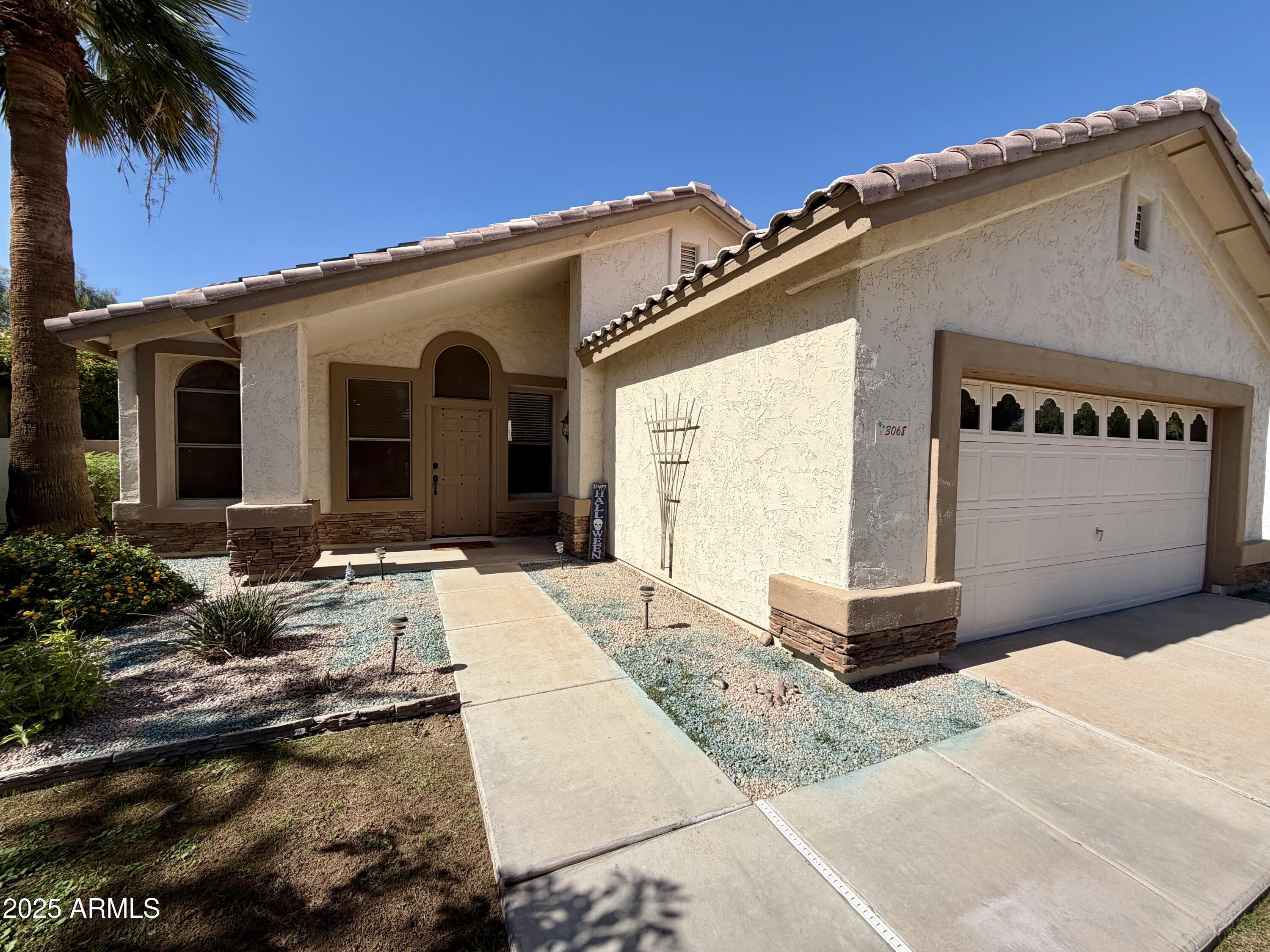 3068 North 83rd Place Scottsdale, AZ 85251 - Photo 5 of 46 a view of a house with a patio
