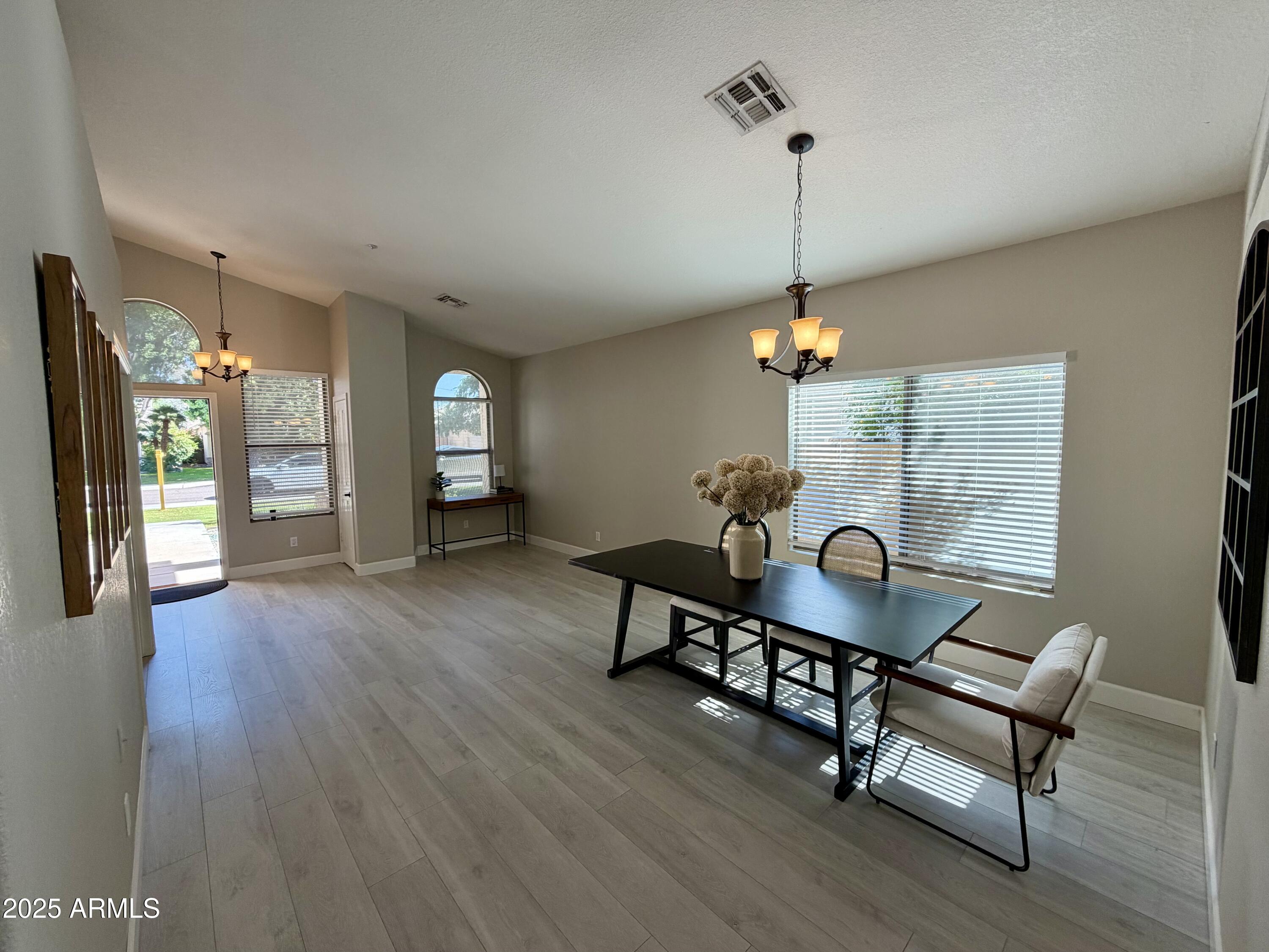 3068 North 83rd Place Scottsdale, AZ 85251 - Photo 8 of 46 a dining room with furniture and window
