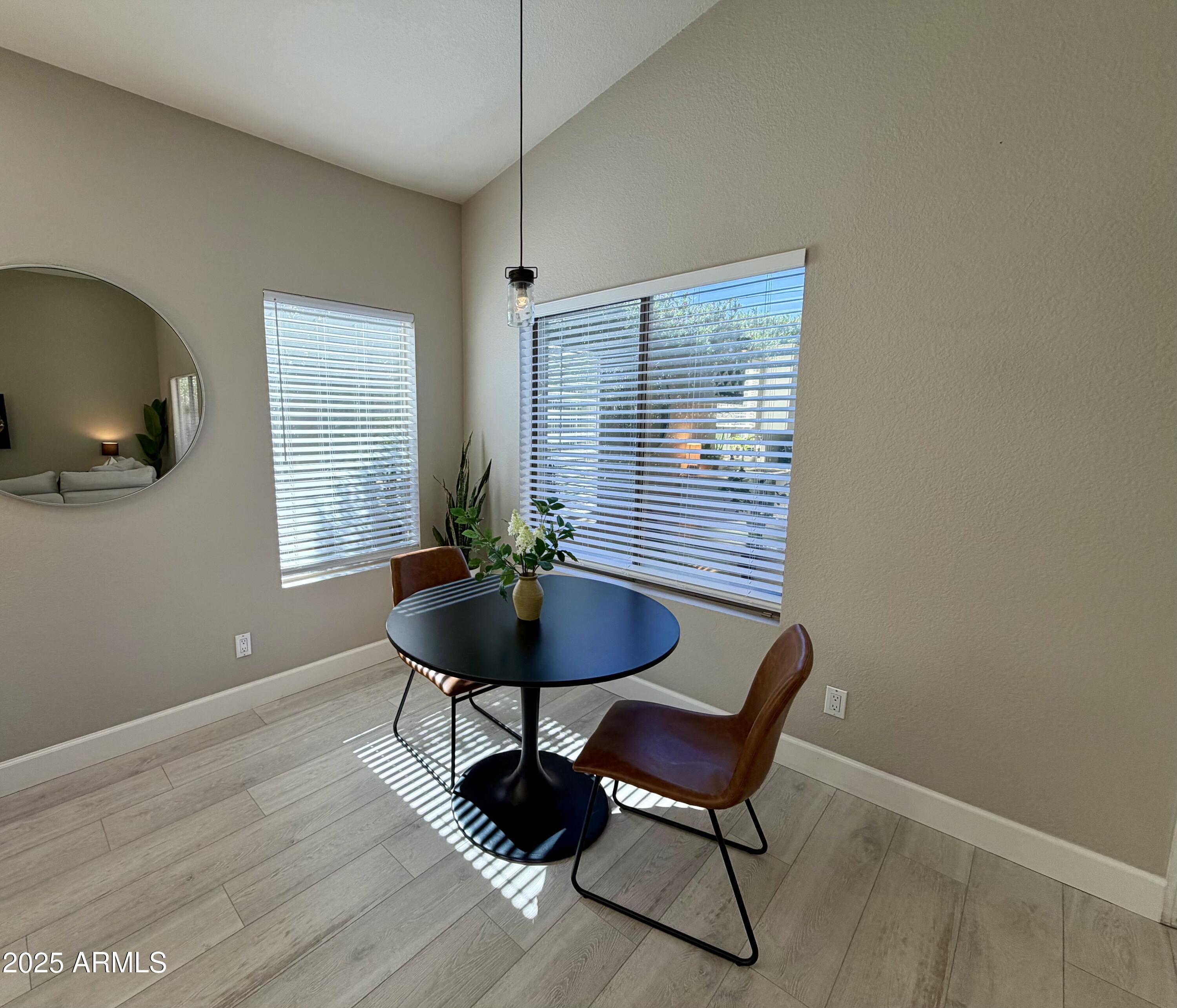 3068 North 83rd Place Scottsdale, AZ 85251 - Photo 10 of 46 a living room with furniture and a potted plant