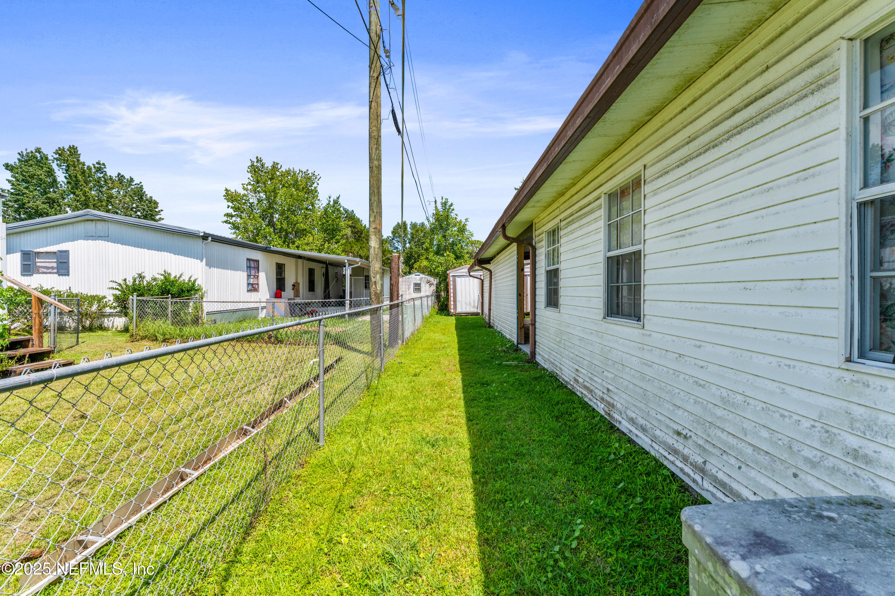 116 Iowa Street Crescent City, FL 32112 - Photo 25 of 25 a view of house with swimming pool