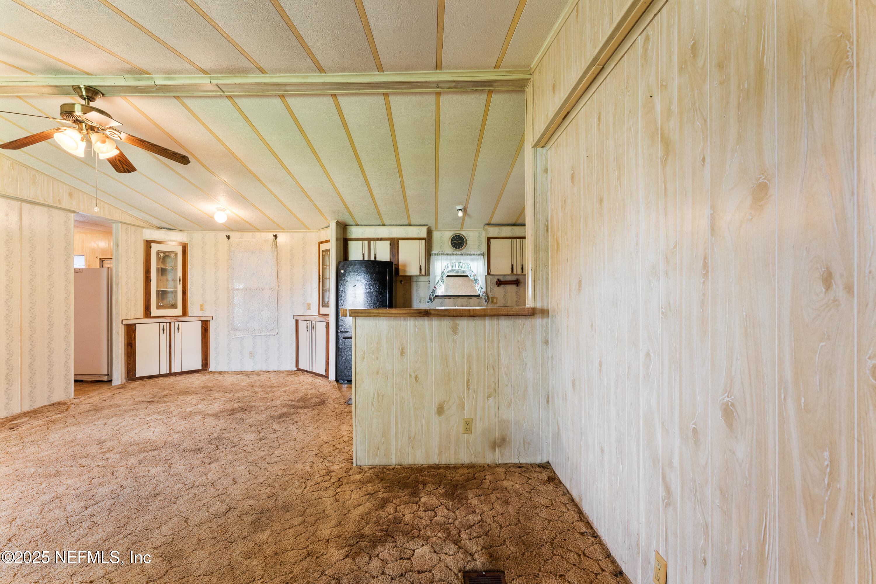 116 Iowa Street Crescent City, FL 32112 - Photo 7 of 25 a view of a room with window