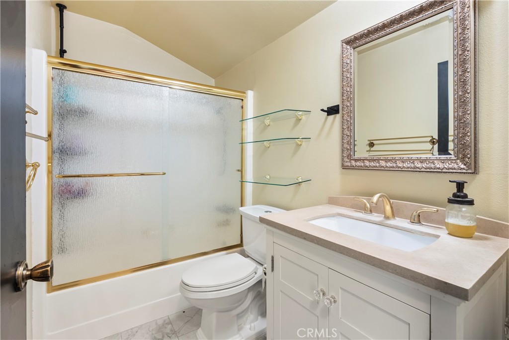 6624 Banyan Place Riverside, CA 92506 - Photo 21 of 41 a bathroom with a sink and a mirror