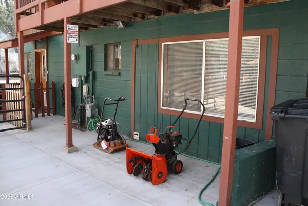 a front view of a house with a deck yard