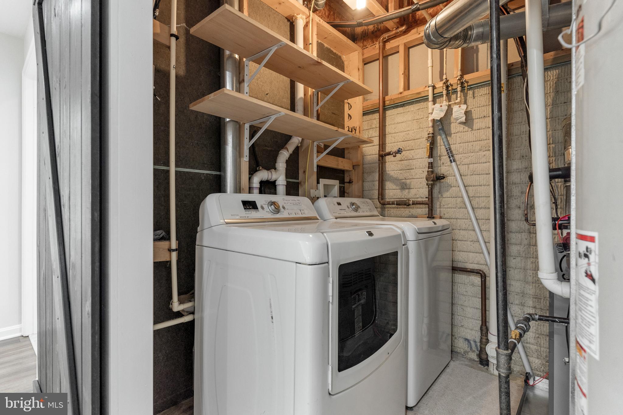 2432 Jostaberry Way Odenton, MD 21113 - Photo 12 of 42 a utility room with dryer and washer