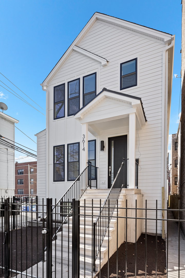 a front view of white house