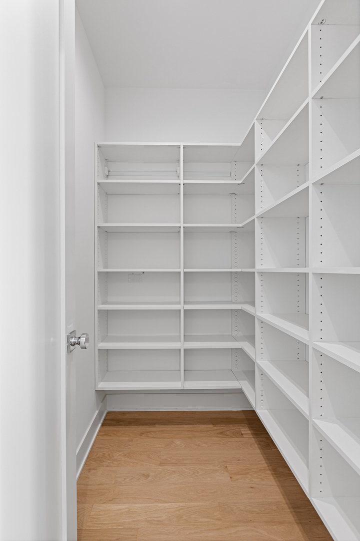 3614 North Marshfield Avenue Chicago, IL 60613 - Photo 18 of 61 a view of a room with shelf on the wall