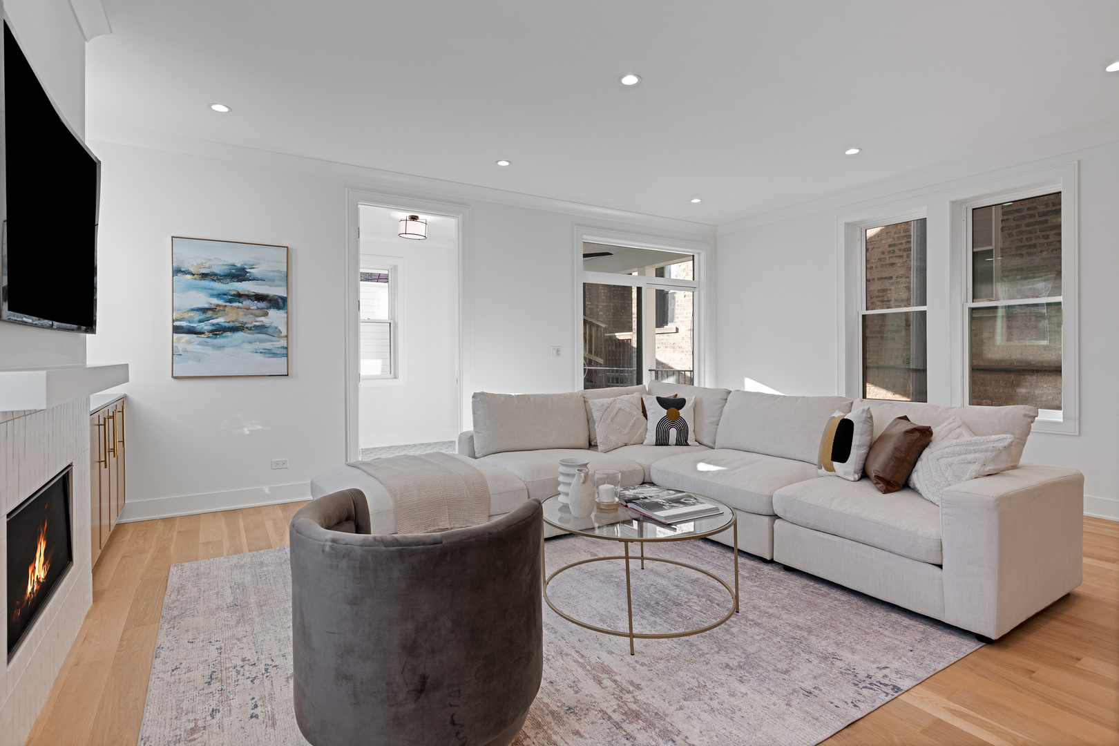 3614 North Marshfield Avenue Chicago, IL 60613 - Photo 21 of 61 a living room with furniture and a flat screen tv