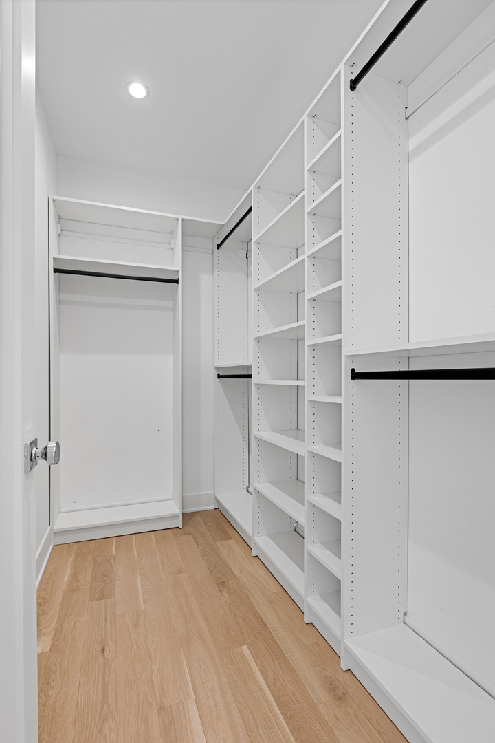 3614 North Marshfield Avenue Chicago, IL 60613 - Photo 29 of 61 a view of walk in closet with empty racks