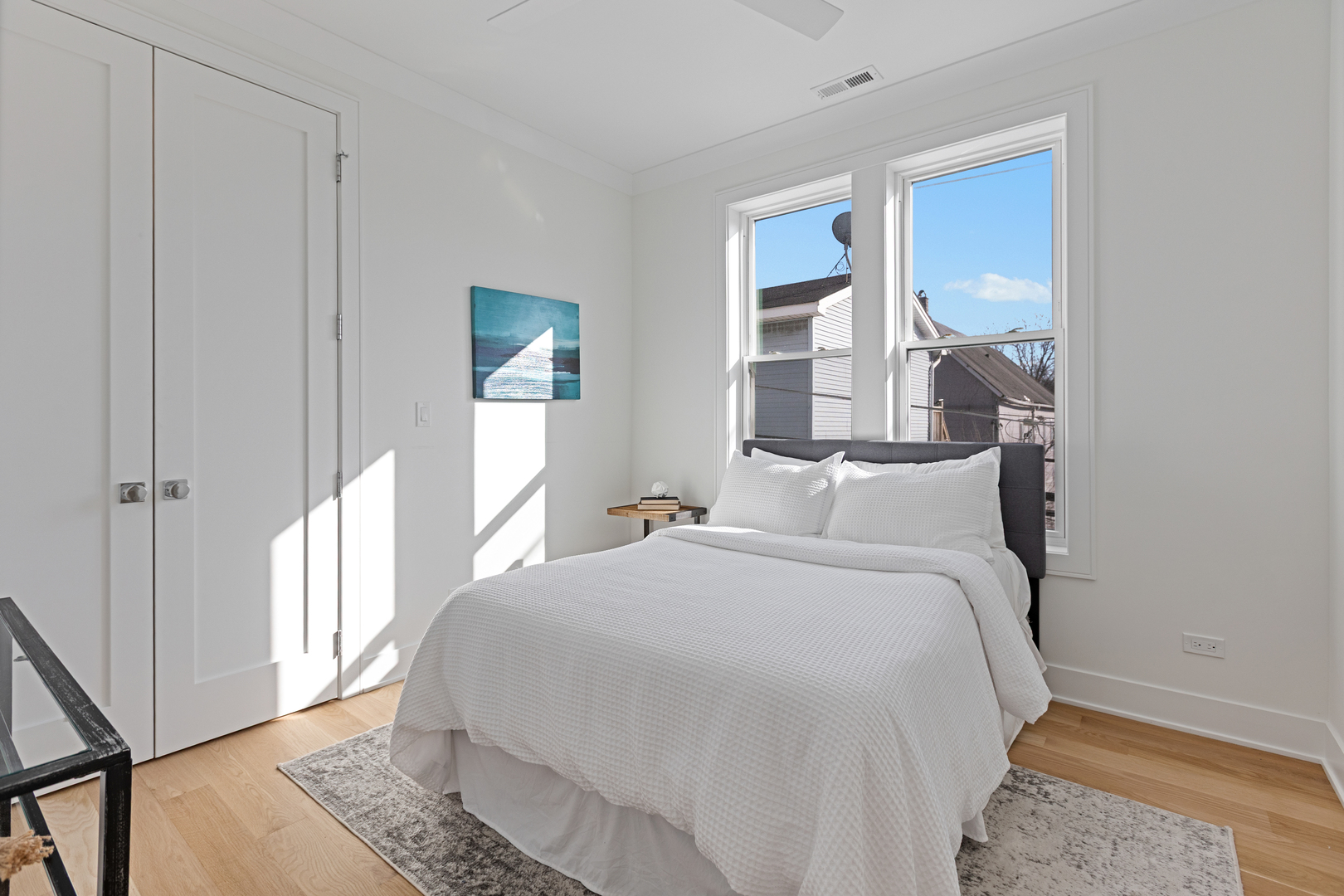 3614 North Marshfield Avenue Chicago, IL 60613 - Photo 33 of 61 a bedroom with a bed and a window