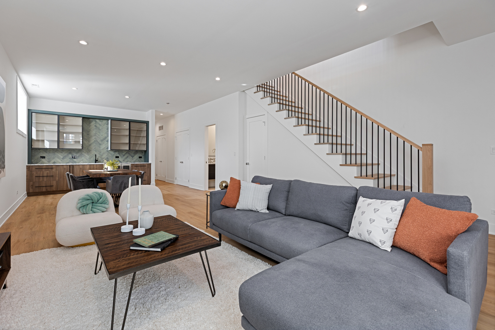 3614 North Marshfield Avenue Chicago, IL 60613 - Photo 38 of 61 a living room with furniture and wooden floor