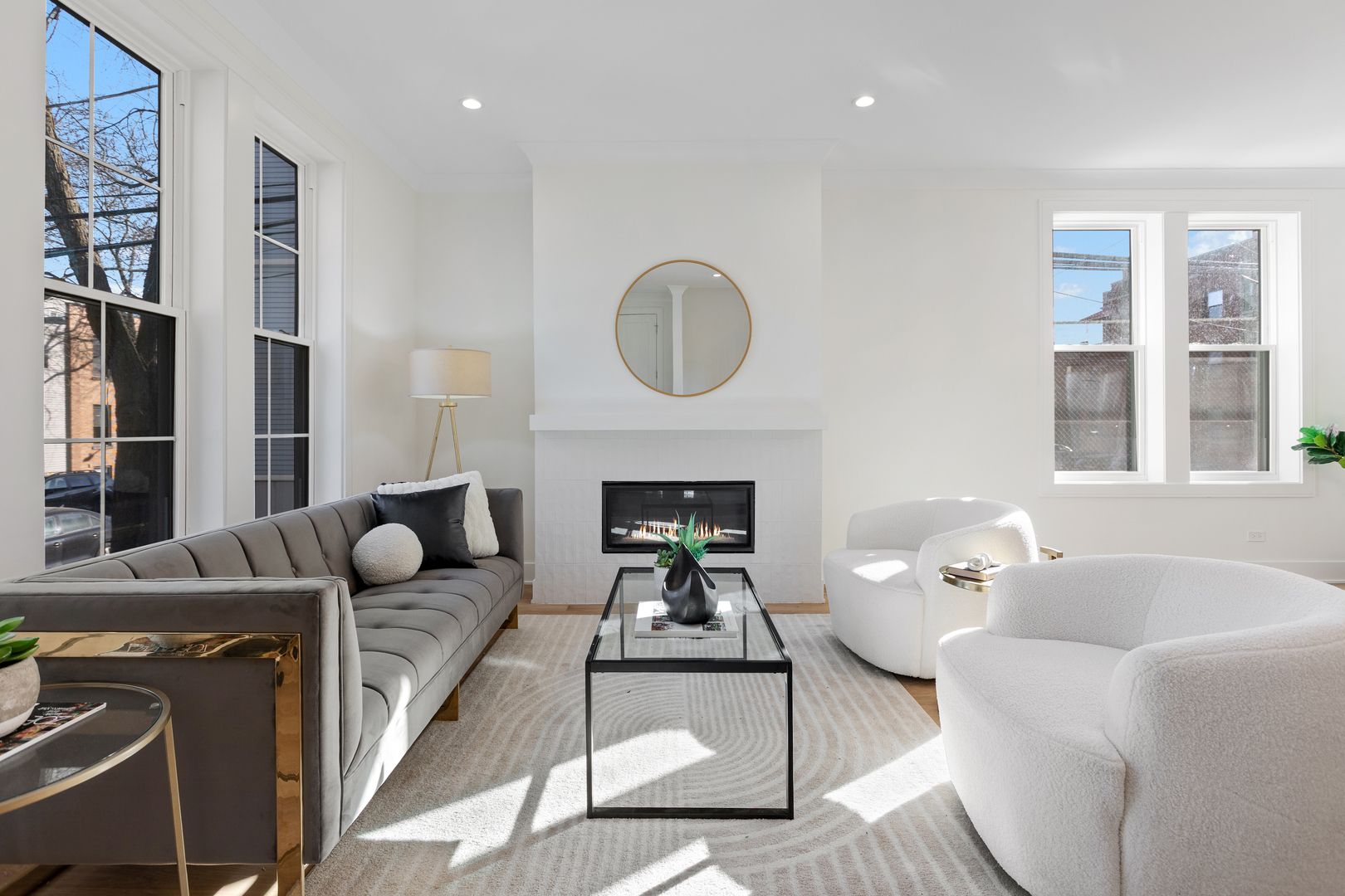 3614 North Marshfield Avenue Chicago, IL 60613 - Photo 4 of 61 a living room with furniture a fireplace and a large window