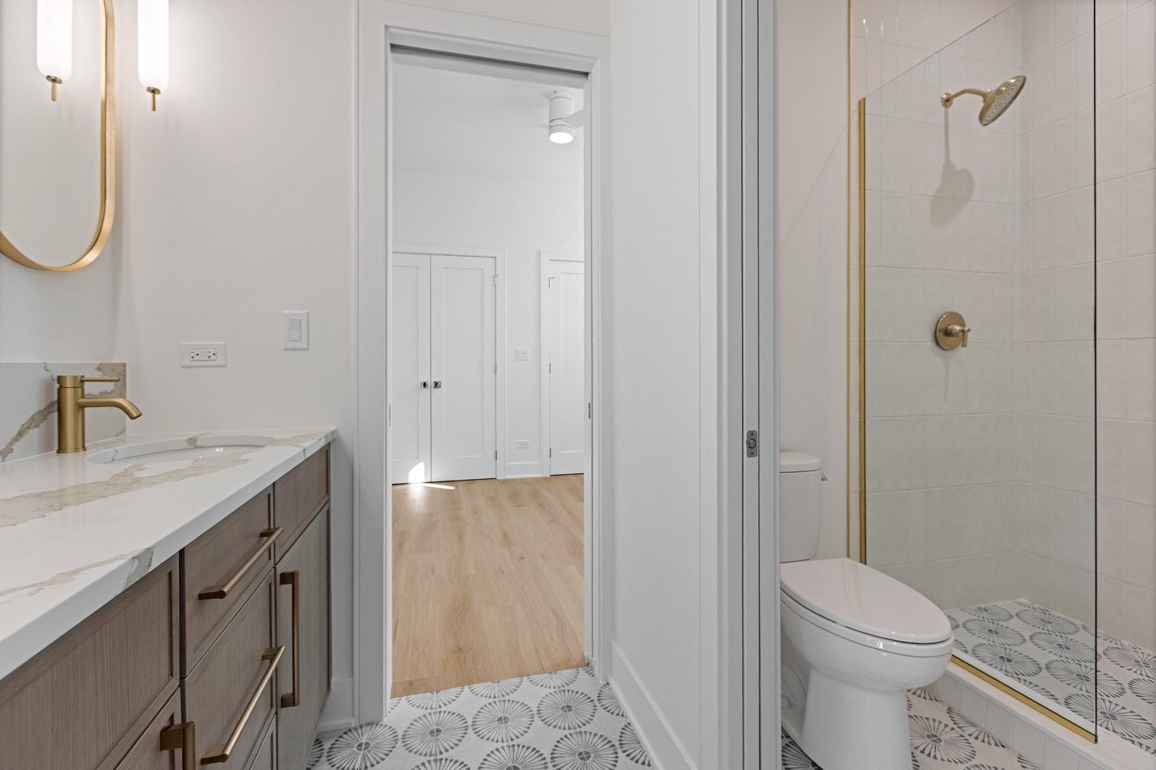 3614 North Marshfield Avenue Chicago, IL 60613 - Photo 46 of 61 a bathroom with a granite countertop sink toilet and shower