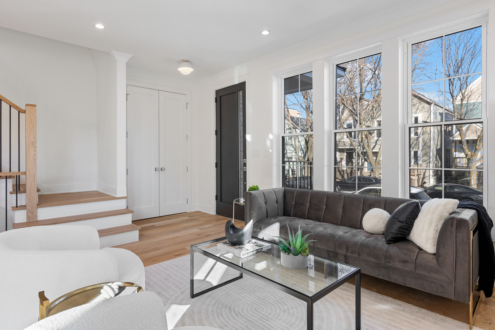 3614 North Marshfield Avenue Chicago, IL 60613 - Photo 6 of 61 a living room with furniture and a large window