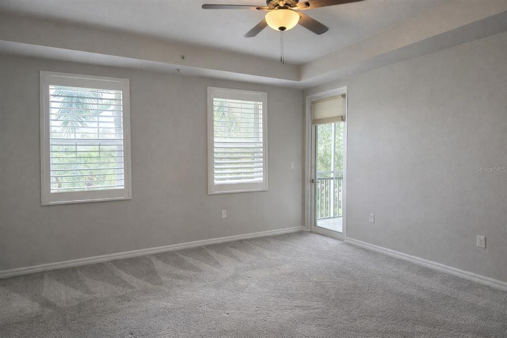 5123 Melbourne Street, Unit D203 Punta Gorda, FL 33980 - Photo 10 of 16 a view of an empty room with a window