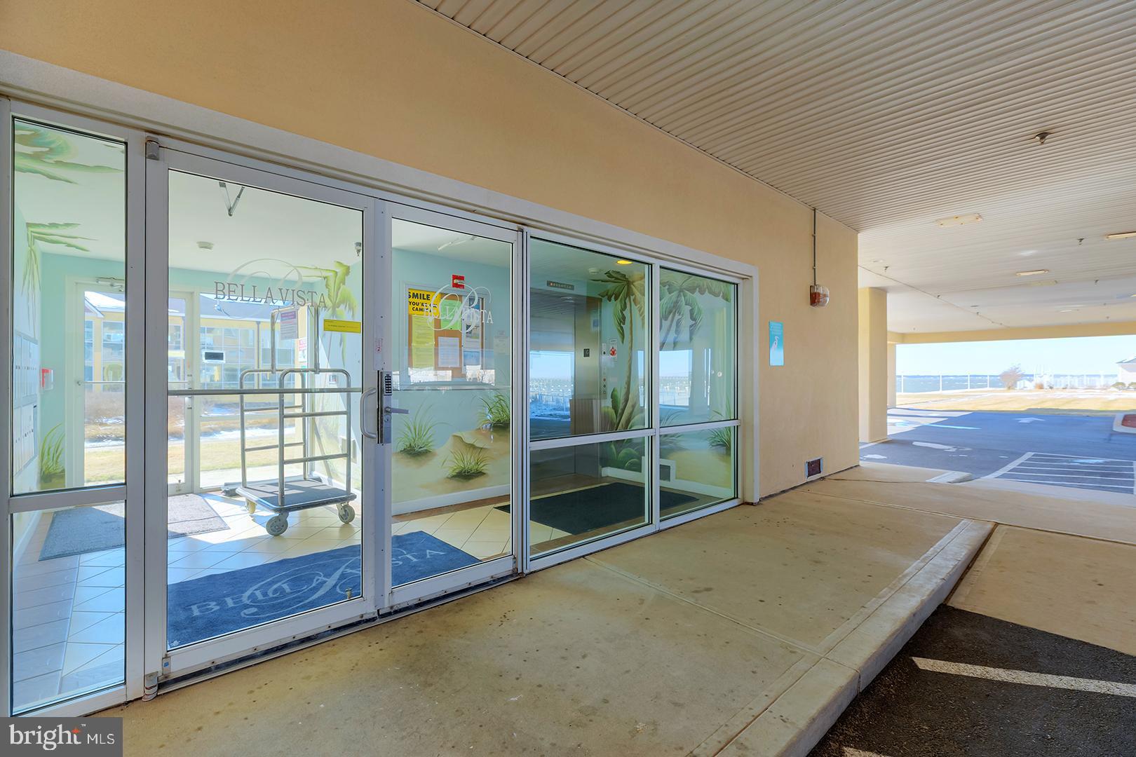 4601 Coastal Highway, Unit 403 Ocean City, MD 21842 - Photo 37 of 56 a room with pool table and glass door