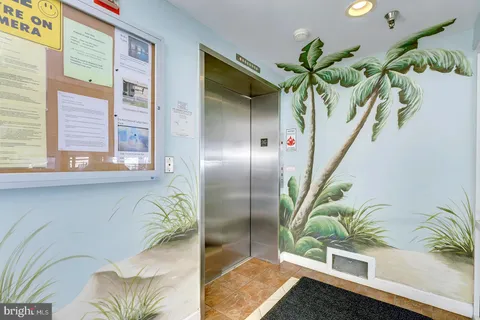 a view of a living room and bathroom