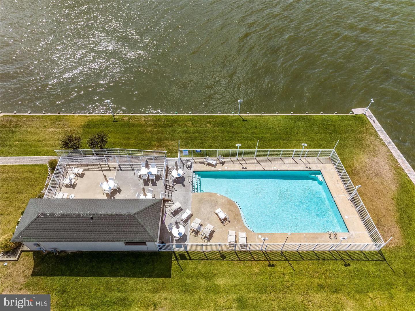 4601 Coastal Highway, Unit 403 Ocean City, MD 21842 - Photo 43 of 56 a view of a swimming pool with an ocean view