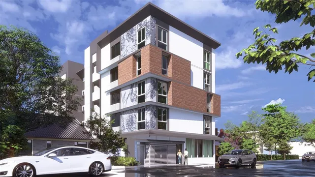 a front view of a building with trees