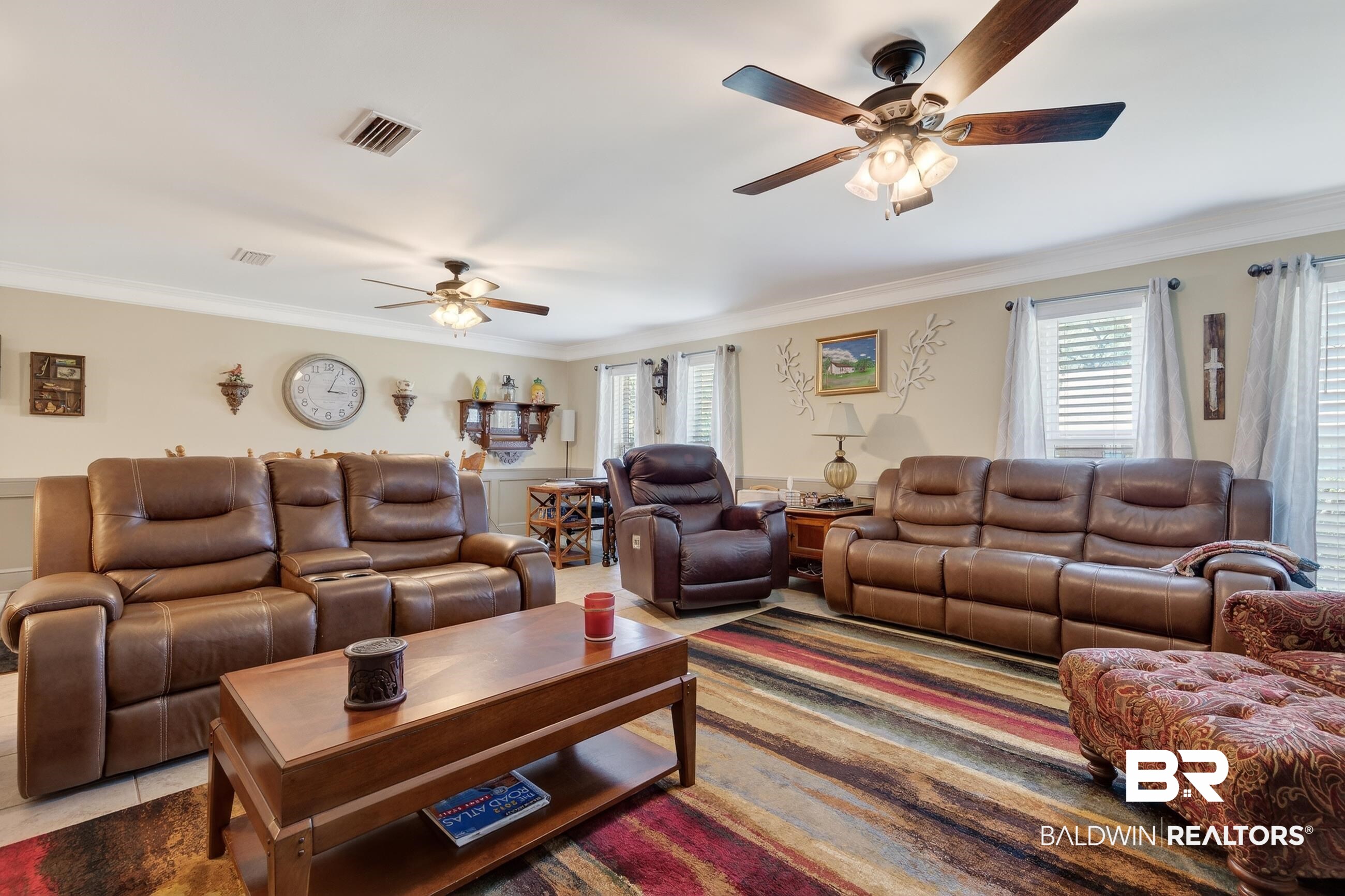1271 Spring Valley Drive South Mobile, AL 36693 - Photo 26 of 56 Tiled living area featuring crown molding and a ceiling fan